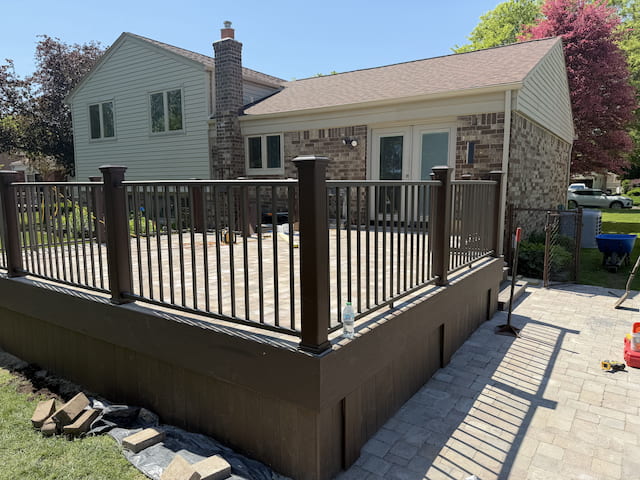 Deck with paver patio and stairs